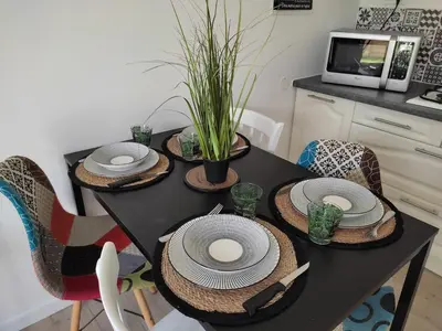 Cuisine ou kitchenette dans l'établissement bienvenue chez vous logement 4 personnes