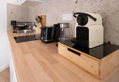 Cuisine ou kitchenette dans l'établissement Suite Guittet - Charme d'Anjou