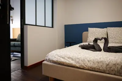 Un ou plusieurs lits dans un hébergement de l'établissement bel appartement 2-4 personnes coeur de ville Angers