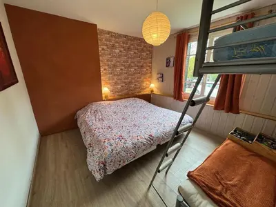 Un ou plusieurs lits dans un hébergement de l'établissement Gîte du Tilleul - un petit coin de nature