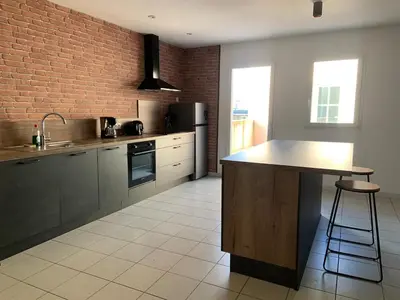 Cuisine ou kitchenette dans l'établissement La Caverne Bretonne