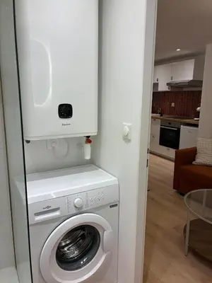 Cuisine ou kitchenette dans l'établissement Appartement Chic 4 personnes - Plein Centre Historique