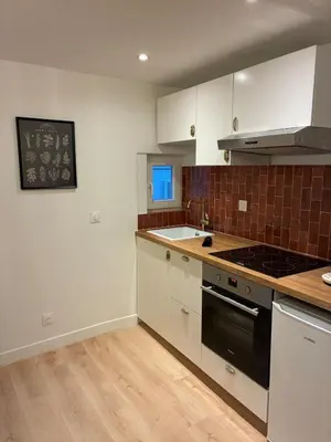 Cuisine ou kitchenette dans l'établissement Appartement Chic 4 personnes - Plein Centre Historique