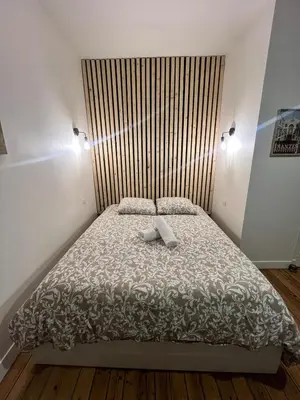 Un ou plusieurs lits dans un hébergement de l'établissement Petit Viarme 2 people Wifi TV