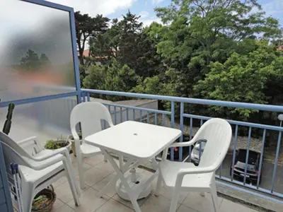 Balcon ou terrasse dans l'établissement Location Vacances Saint-Jean-de-Monts: T2 Centre-Ville, Proche Plage et Commerces - FR-1-777-9