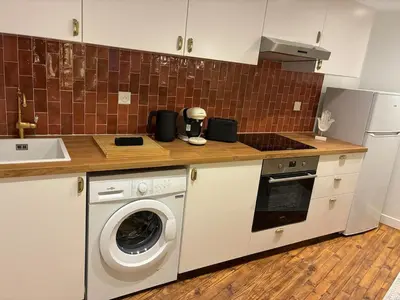 Cuisine ou kitchenette dans l'établissement Appartement chic & cosy - 6 couchages Angers