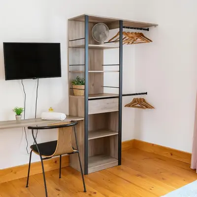Télévision ou salle de divertissement dans l'établissement Joli studio lumineux Chez Madeleine