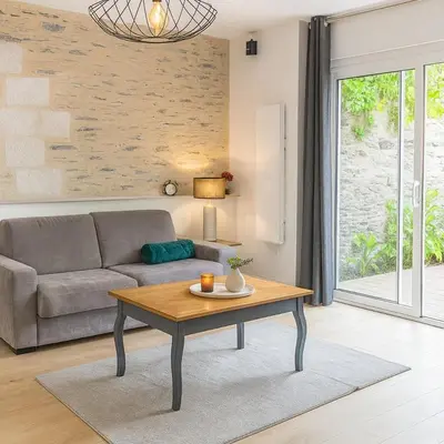 Coin salon dans l'établissement T2 premium avec terrasse Chez Henri
