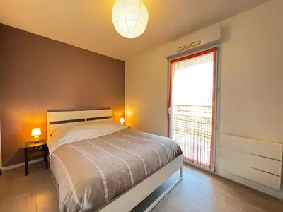 Un ou plusieurs lits dans un hébergement de l'établissement Le Bignon - Wifi, TV, 4 personnes, 1 min à pied du tram
