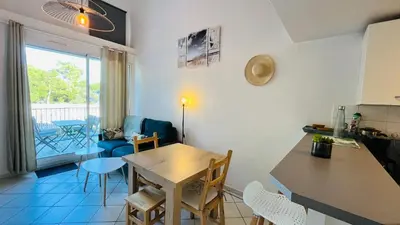 Coin salon dans l'établissement Piscine, lac et golf - Appartement Hollywood