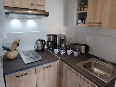 Cuisine ou kitchenette dans l'établissement Maisonnette cosy à La Barre de Monts - 4 pers, parking - FR-1-540-326