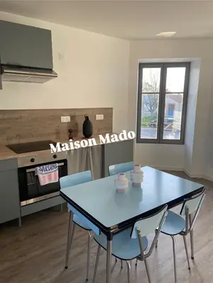 Cuisine ou kitchenette dans l'établissement Maison Mado
