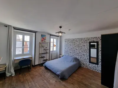 Un ou plusieurs lits dans un hébergement de l'établissement Studio en centre-ville