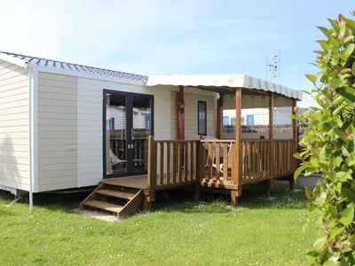 Jardin de l'établissement Mobil-home 24m² avec terrasse à Saint-Jean-de-Monts - API-1-52-918