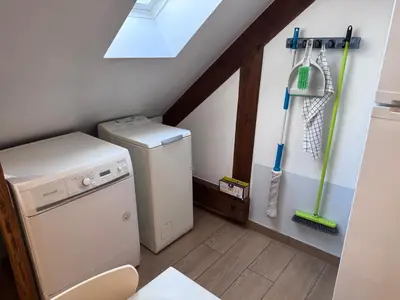 Cuisine ou kitchenette dans l'établissement La Mansarde