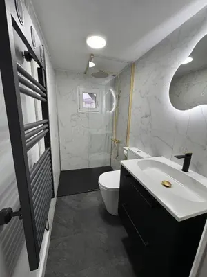 Salle de bains dans l'établissement Appartement - Les Herbiers, France