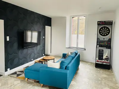 Coin salon dans l'établissement Petite maison au cœur de la ville