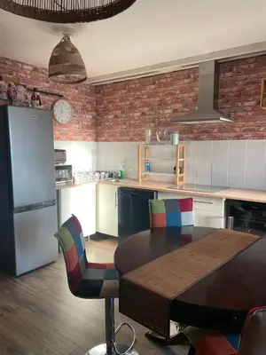 Cuisine ou kitchenette dans l'établissement Appartement Tagada