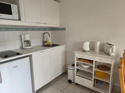 Cuisine ou kitchenette dans l'établissement L'Orée du Golf - Balcon & Parking