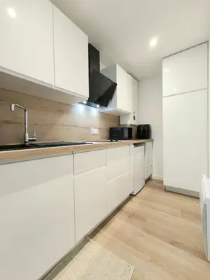 Cuisine ou kitchenette dans l'établissement Les Embruns - Studio avec terrasse vue mer