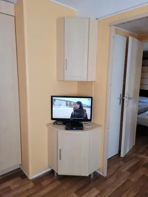 Télévision ou salle de divertissement dans l'établissement MH Bois Dormant 6 pers 3ch avec Lave Linge et TV