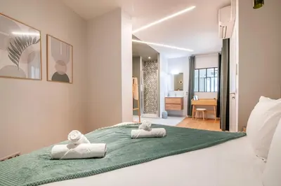 Un ou plusieurs lits dans un hébergement de l'établissement L'Atelier 23, Penthouse au coeur de Cholet