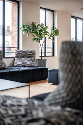 Coin salon dans l'établissement L'Atelier 23, Penthouse au coeur de Cholet