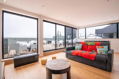 Coin salon dans l'établissement L'Atelier 23, Penthouse au coeur de Cholet
