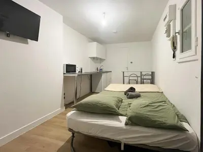 Un ou plusieurs lits dans un hébergement de l'établissement studio 2 personnes la doutre