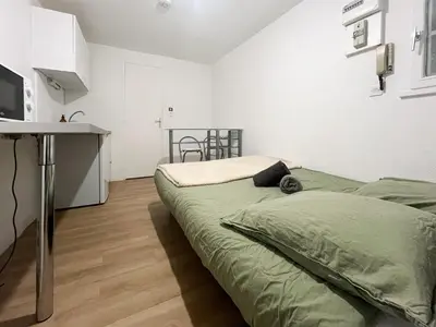 Un ou plusieurs lits dans un hébergement de l'établissement studio 2 personnes la doutre