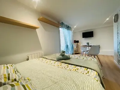 Télévision ou salle de divertissement dans l'établissement Casa Tropical