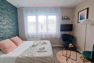 Un ou plusieurs lits dans un hébergement de l'établissement Nouveau - La Cabine du Capitaine