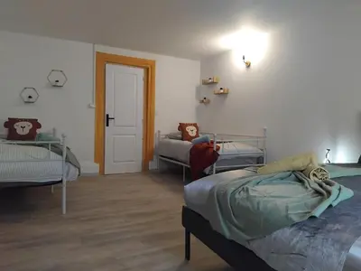 Un ou plusieurs lits dans un hébergement de l'établissement Au bon VERGER Appartement en coeur de ville hyper centre
