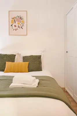 Un ou plusieurs lits dans un hébergement de l'établissement L'Interlude Nantais Appartement proche centre ville