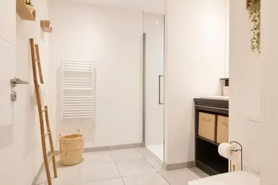 Salle de bains dans l'établissement L'Interlude Nantais Appartement proche centre ville