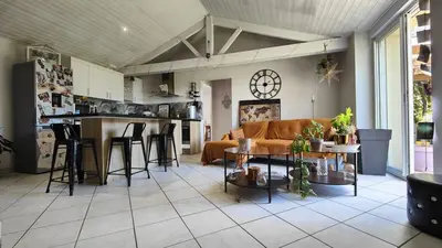 Coin salon dans l'établissement Charmante maison t3 avec 2 chambres et jardin clos
