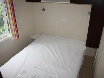 Un ou plusieurs lits dans un hébergement de l'établissement Mobil-Home avec Terrasse pour 6 personnes - API-1-52-1359