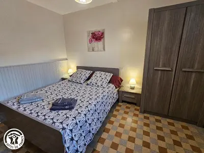Un ou plusieurs lits dans un hébergement de l'établissement Gîte familial cosy à proximité du Puy du Fou - FR-1-426-598