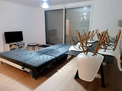 Un ou plusieurs lits dans un hébergement de l'établissement Maison et studio 12 personnes 12 kilomètres du parc du puy du f