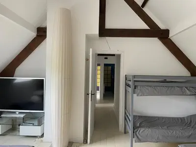Un ou plusieurs lits dans un hébergement de l'établissement Maison 16 couchages, 10 min de la plage