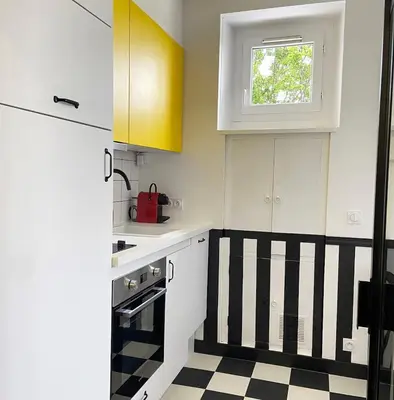 Cuisine ou kitchenette dans l'établissement Le Mondrian - Vue sur Erdre - Proche Gare-Tram