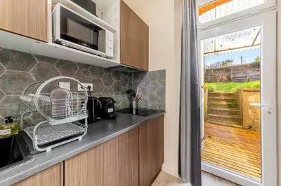 Cuisine ou kitchenette dans l'établissement La Citadelle - T2 Médiéval près de la Gare