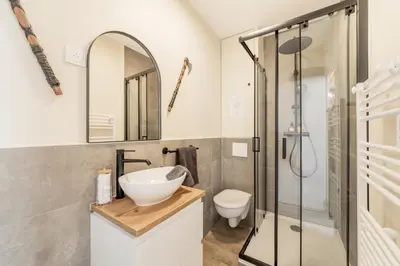 Salle de bains dans l'établissement La Citadelle - T2 Médiéval près de la Gare