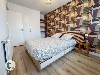 Un ou plusieurs lits dans un hébergement de l'établissement Tranquiloue - Maison calme - 15min du Puy du Fou