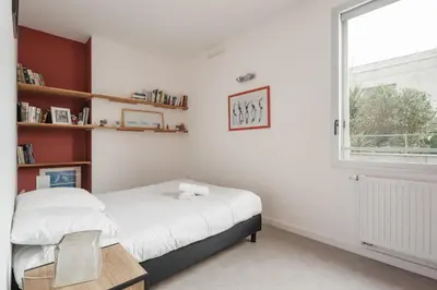 Un ou plusieurs lits dans un hébergement de l'établissement Bel Appartement 80m2 - 2 Parkings - Ile de Nantes