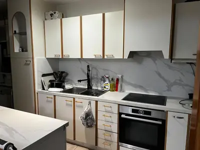 Cuisine ou kitchenette dans l'établissement Beautiful apartment located in a quiet residence