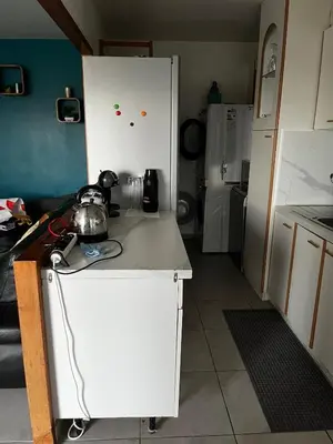 Cuisine ou kitchenette dans l'établissement Beautiful apartment located in a quiet residence