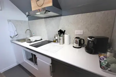 Cuisine ou kitchenette dans l'établissement Le Chalet - Résidence Chez Gally à Angers