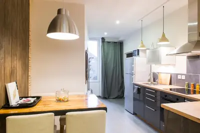 Cuisine ou kitchenette dans l'établissement Unsejouranantes - Gîte Lamoricière