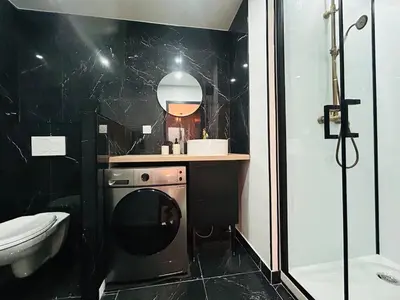 Salle de bains dans l'établissement Casa Belfort T2 avec Jardin